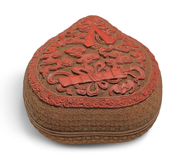 A CARVED CINNABAR LACQUER 'PEACH' BOX AND COVER QING DYNASTY, QIANLONG PERIOD