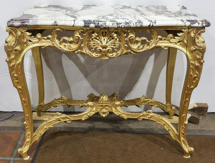 An Italian giltwood carved marble top table circa 1860