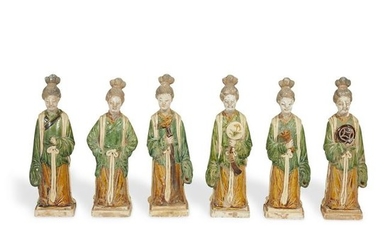 A group of six Chinese pottery female attendants