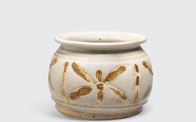 A cream glazed short jar with brown inlay decoration