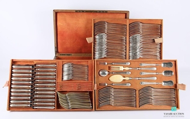 A 147-piece silver dinnerware set, the fillet hemmed handle is decorated with guilloche work, comprising thirty table place settings, twelve table forks, twenty-three table knives, the handles in silver with a silver filling and steel blades...