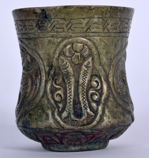 A 19TH CENTURY ISLAMIC BEAKER, decorated with mythical