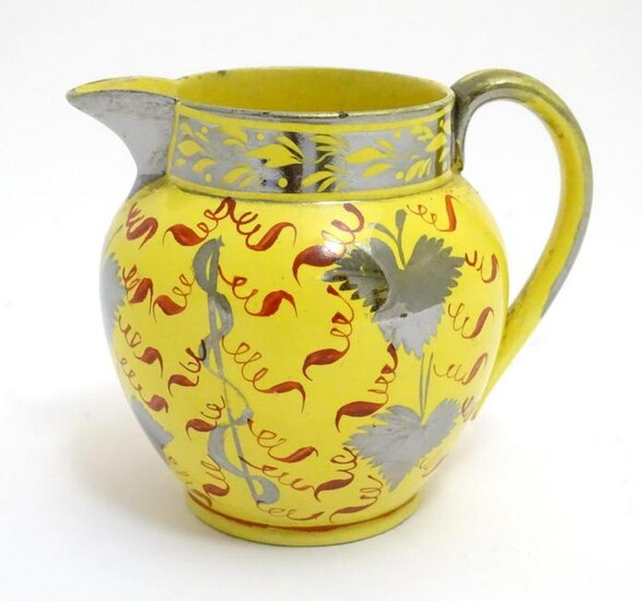 A 19thC canary yellow Sunderland lustre cream jug with
