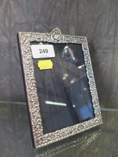 A 999 silver photo frame, with decorative cast border, Londo...