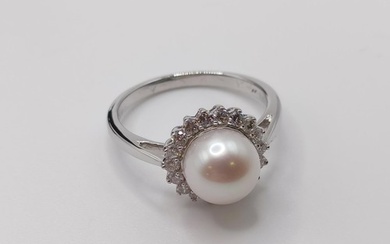 A 9ct white gold cultured pearl and R/C diamond halo ring, b...