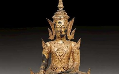 A BRONZE FIGURE OF THE THE SEATED CROWNED BUDDHA.