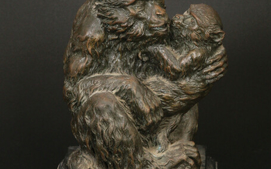 A BRONZE SCULPTURE IN THE FORM OF TWO MONKEYS