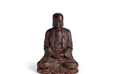 A CARVED AND LACQUERED WOOD SEATED FIGURE OF BUDDHA 17th...