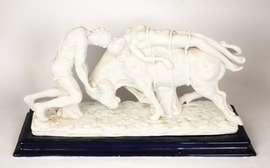 A CERAMIC GROUP FIGURE OF EUROPA AND THE BULL