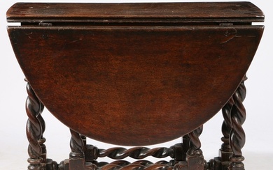 A CHARLES II OAK GATELEG TABLE, WITH SPIRAL-TURNED LEGS, CIR...