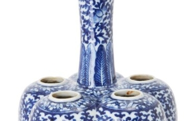 A Chinese blue and white six-section tulip vase, 19th century, formed with five lobes and a flared neck, painted with lotus and foliage to each side, 27cm high. 十九世紀 青花繪纏枝蓮紋五聯瓶