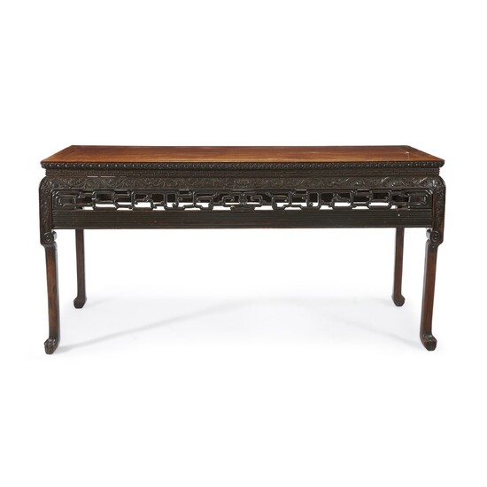 A Chinese carved hardwood recessed-waist painting table