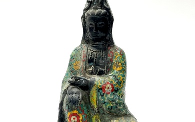 A Chinese enamelled bronze figure of a seated goddess Guanyin H. 30cm