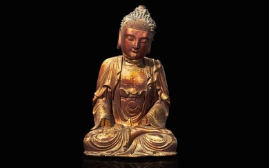 A Chinese gilt lacquered figure of Buddha, Ming to Qing dynasty 木漆金佛