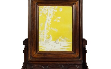 A Chinese yellow-ground carved porcelain screen, 19th century