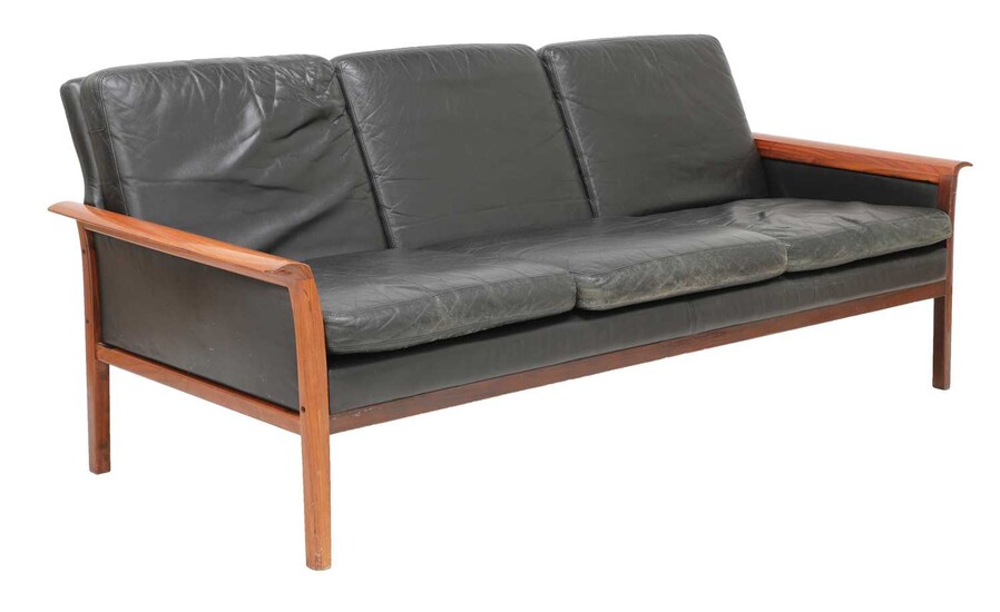 A Danish black leather sofa, §