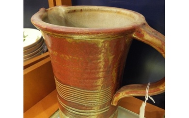 A Donald Granville studio pottery rustic ware jug