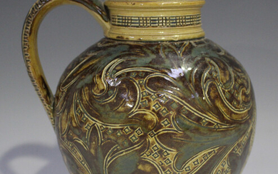 A Doulton Lambeth stoneware jug, circa 1873, decorated by Arthur B. Barlow, monogrammed, with scroll