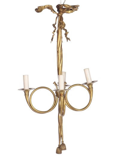 A French Art Nouveau gilt bronze chandelier, four branches. Circa 1900. H. 80. Diam. 45 cm.