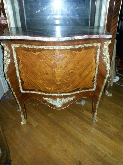 A French Marquetry Bronse Ormolu Commode. Late 19Th