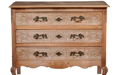 A French oak commode in Louis XVI style
