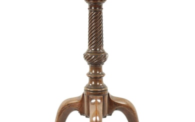 A GEORGE III MAHOGANY CANDLE STAND with dished circular...