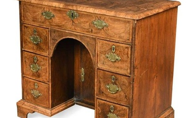 A George II walnut kneehole desk