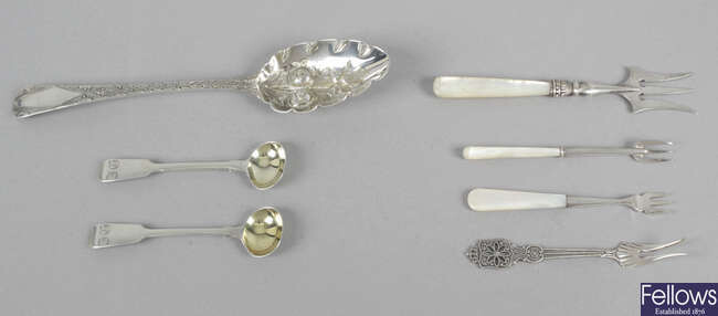 A George III silver 'berry' spoon, a pair of George IV Fiddle pattern mustard spoons, a Victorian dessert knife, plus four pickle forks & two butter knives.