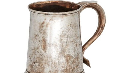 A George III silver tankard, London, c.1773, maker's mark rubbed (?K), of tapering cylindrical form, the plain body to flattened handle with monogrammed thumbpiece, 11.6cm high, approx. weight 10.3oz cf: For a similar example with maker 'IK' see...