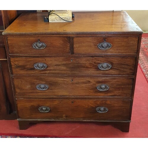 A Georgian Mahogany Chest of Drawers with two short and thre...