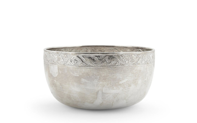 A Japanese partial gilt silver bowl with repousse rim