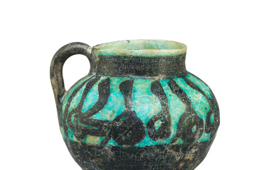 A Kashan silhouette ware pottery jug Persia, 12th Century