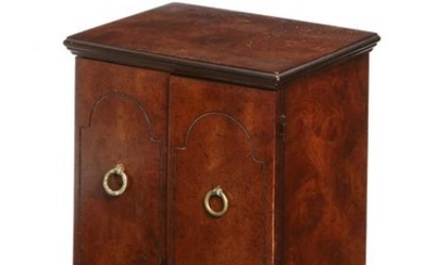 A Knob Creek mixed wood table cabinet