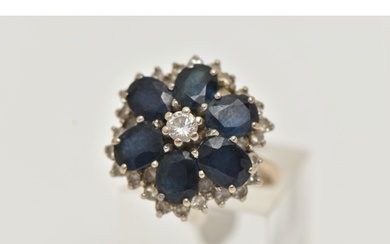 A LARGE 18CT GOLD SAPPHIRE AND DIAMOND CLUSTER RING, six ova...