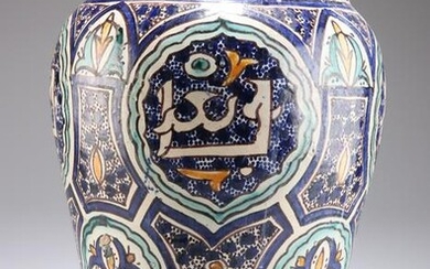 A LARGE PERSIAN TIN-GLAZED EARTHENWARE VASE, 19TH