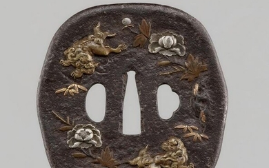 A LARGE TSUBA WITH SHISHI AND PEONIES, CERTIFIED