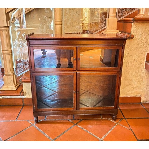 A MAHOGANY CABINET, LATE 19TH CENTURY The rectangular top a...