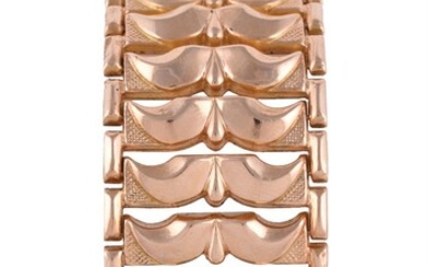 A MID 20TH CENTURY GOLD COLOURED BROAD BRACELET, CIRCA 1950
