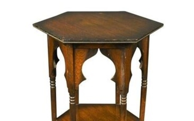 A Moorish oak occasional table, probably retailed by Liberty & Co.