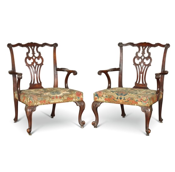 A PAIR OF GEORGE II CARVED MAHOGANY OPEN ARMCHAIRS, CIRCA 1755