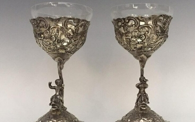 A PAIR OF GERMAN SILVER SALTS WITH GLASS INSERTS