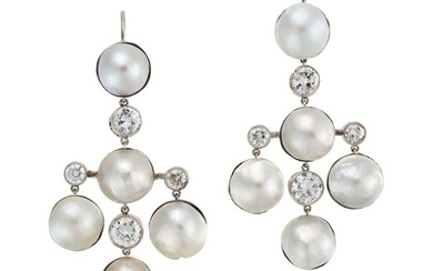 A PAIR OF NATURAL SALTWATER PEARL AND DIAMOND DROP EARRINGS each comprising a row of alternating