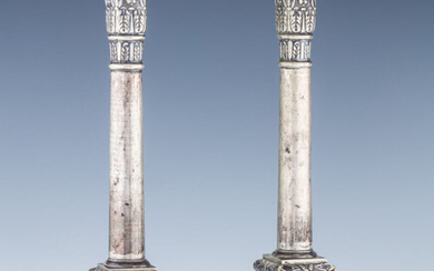 A PAIR OF SILVER CANDLESTICKS. Warsaw, c. 1920. Each...