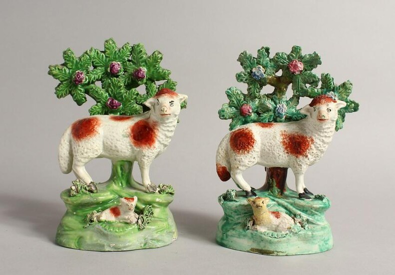 A PAIR OF STAFFORDSHIRE BOCAGE GROUP OF SHEEP with
