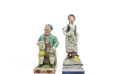 A PEARLWARE FIGURE OF SOUTER JOHNNIE Early 19th century, the...