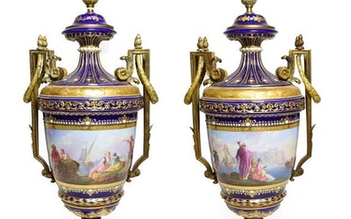 A Pair of Gilt Metal Mounted Sèvres Style Porcelain Vases...