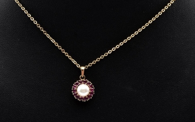 A RUBY AND PEARL CLUSTER PENDANT IN 9CT GOLD (DISPLAY CHAIN)