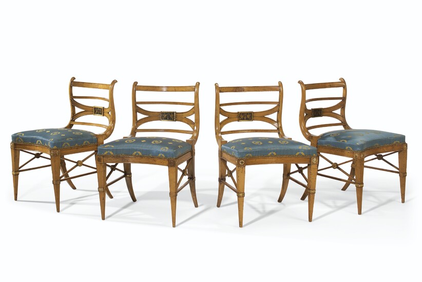 A SET OF FOUR ITALIAN BEECHWOOD PARCEL-EBONIZED AND PARCEL-GILT SIDE CHAIRS, PROBABLY LUCCA, EARLY 19TH CENTURY, AND POSSIBLY AFTER A DESIGN BY LORENZO NOTTOLINI