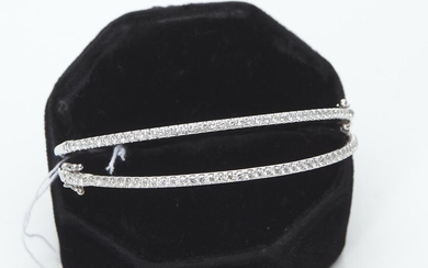 A SET OF TWO DIAMOND BANGLES IN 18CT WHITE GOLD, TOTAL DIAMOND WEIGHT 3.20CTS, INNER DIAMETER 57MM, 17.6GMS