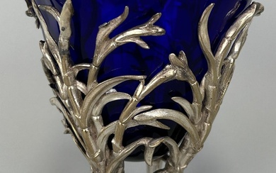 A SILVER PLATED SWEET MEAT DISH WITH BLUE GLASS...